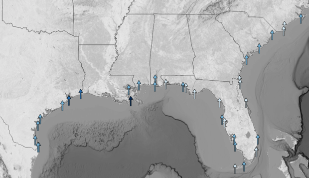 NOAA tide-gauge map of the U.S. Gulf and Southeast Atlantic coasts with arrows showing direction and magnitude of observed sea level trends